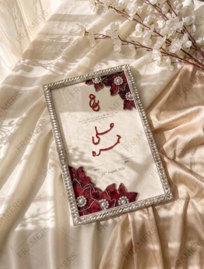 Crystal Nikkah Frame with Crimson Floral Zardozi, standing on cream silk