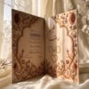 Embellished Nikkah booklet standing open with gold beadwork, pearls and crystals on both pages