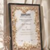 Pearl and Gold Floral Nikkah Certificate in fancy black frame