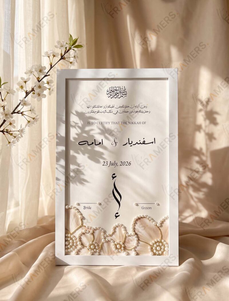 White Pearl Garland & Blush Rosette Embellished Nikkah Frame, standing on cream silk